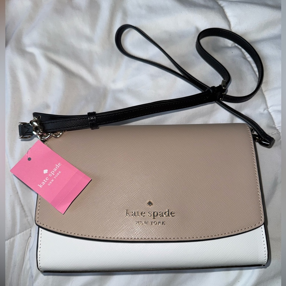 Convertible crossbody (never used) Including complimentary wallet (barely used)